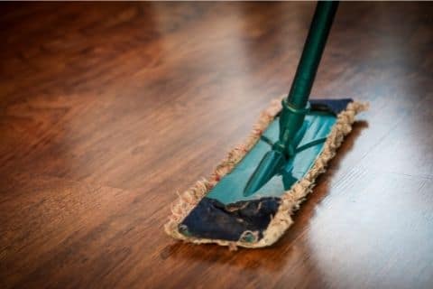 Clean the floor with mop