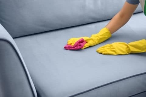 Deep clean your couch with a wet rag