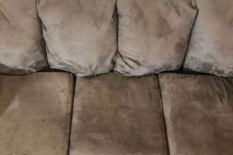 Can I use water to clean my fabric sofas
