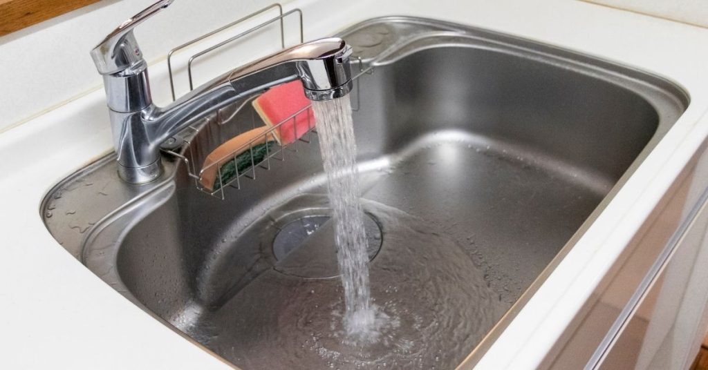 How to clean a pulldown kitchen faucet spray head Sparkling and Beyond