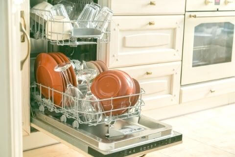 How often should the dishwasher be cleaned