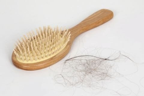 How to get dust out of a hairbrush