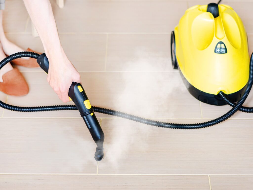 Clean the grout with a steam cleaner