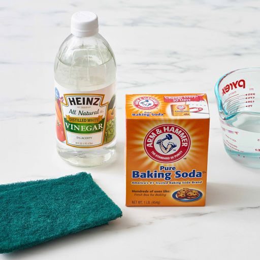 Cleaning a dishwasher with vinegar and baking soda